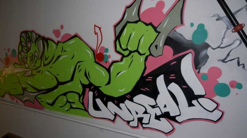 Illustration for article titled Epic Games' History Unfolds in This Graffiti-Covered Stairwell